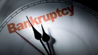 Debt, Division, Dysfunction, and National Bankruptcy