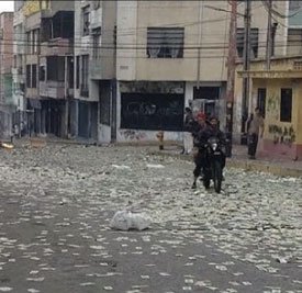 The streets of Venezuela are littered with worthless paper money.